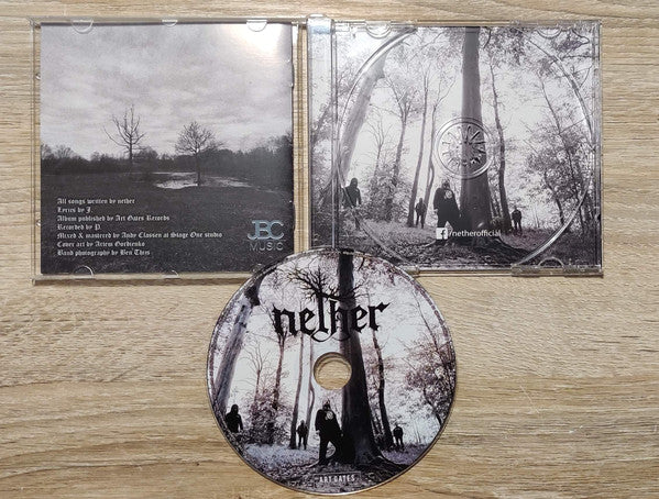 Nether (4) : Between Shades And Shadows (CD, Album)