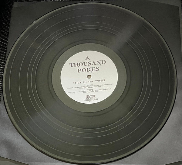 Stick In The Wheel : A Thousand Pokes (LP)