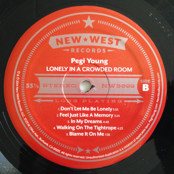 Pegi Young & The Survivors : Lonely In A Crowded Room (LP, Album)
